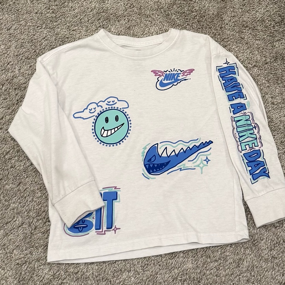 Nike Kids White Long Sleeve Tee with Blue Graphics